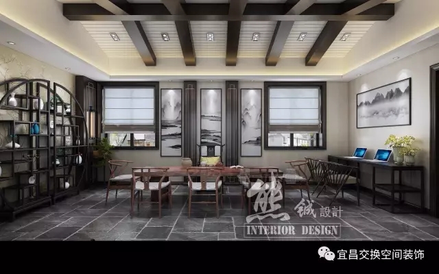 一種心曠神怡之感：悠悠的暖燈、純美的紅木博古架、秀麗的瓷器擺設、山水掛畫體現出中國文化的博大精深，右邊設計了現代化的辦公區域，充分滿足業主不同的需求。